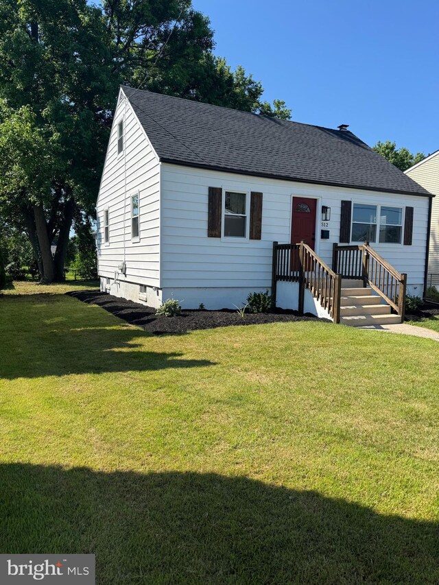 512 Majestic Ave, Bellmawr, NJ 08031 - view of front of house featuring a front yard and roof with shingles