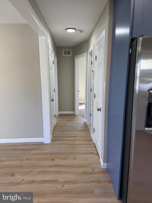 512 Majestic Ave, Bellmawr, NJ 08031 - hallway featuring baseboards and light wood-style floors