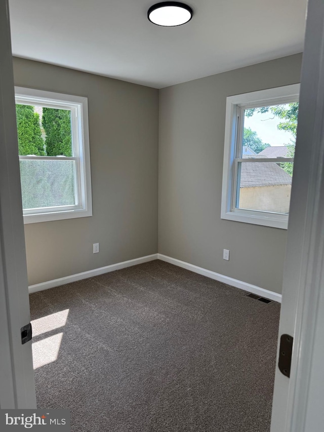 512 Majestic Ave, Bellmawr, NJ 08031 - unfurnished room with baseboards and carpet floors
