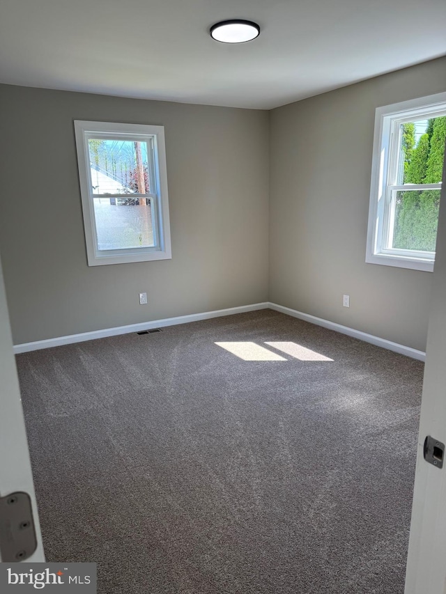 512 Majestic Ave, Bellmawr, NJ 08031 - carpeted spare room featuring baseboards