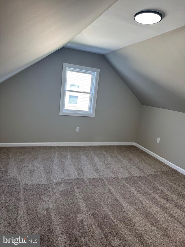 512 Majestic Ave, Bellmawr, NJ 08031 - bonus room featuring carpet floors and vaulted ceiling