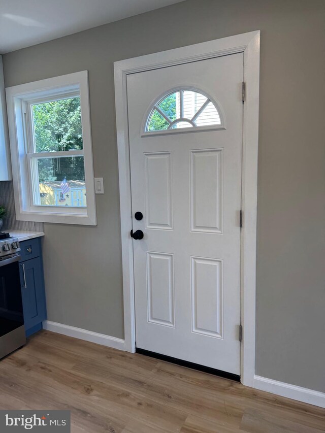 512 Majestic Ave, Bellmawr, NJ 08031 - foyer featuring baseboards and light wood-style floors