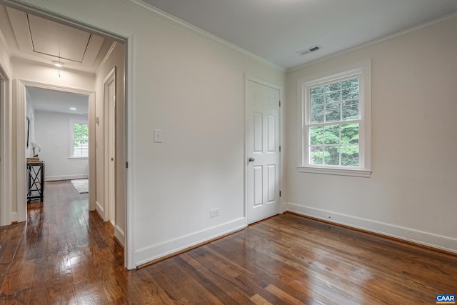1623 Mason Ln, Charlottesville, VA 22903 - unfurnished bedroom with attic access, dark wood-style floors, and ornamental molding