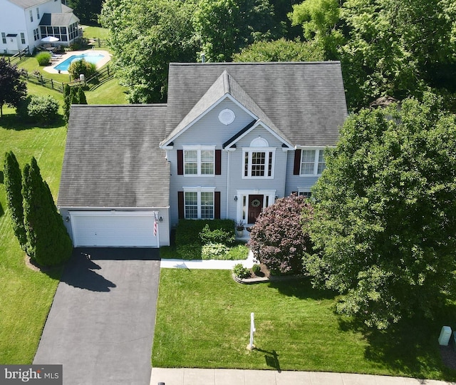 6 Thunder Gulch, Newark, DE 19702 - view of front of property featuring asphalt driveway, a garage, and a shingled roof