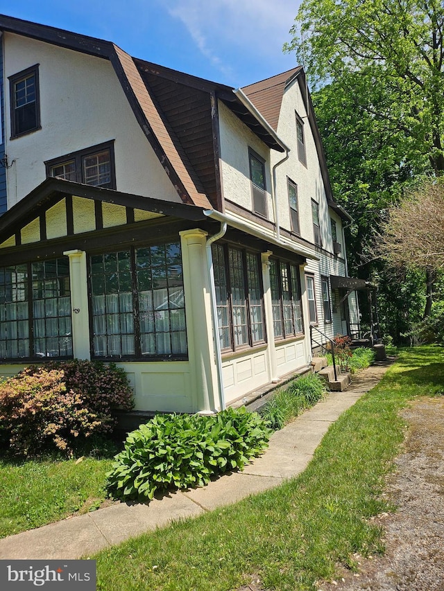 409 W Beechtree Ln, Wayne, PA 19087 - view of property exterior featuring stucco siding