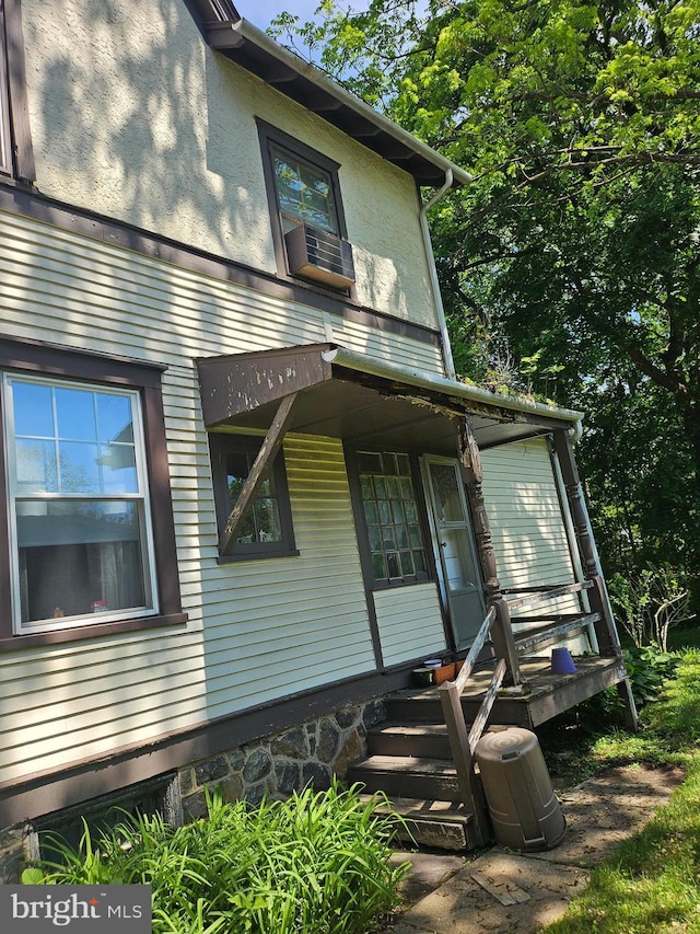 409 W Beechtree Ln, Wayne, PA 19087 - view of front facade featuring stucco siding