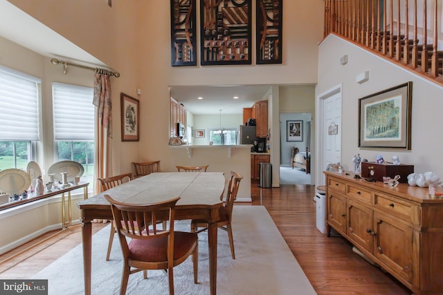 802 Geranium Dr, Warrington, PA 18976 - dining area with light wood-style floors and a high ceiling