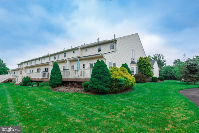 802 Geranium Dr, Warrington, PA 18976 - back of property featuring a wooden deck and a yard