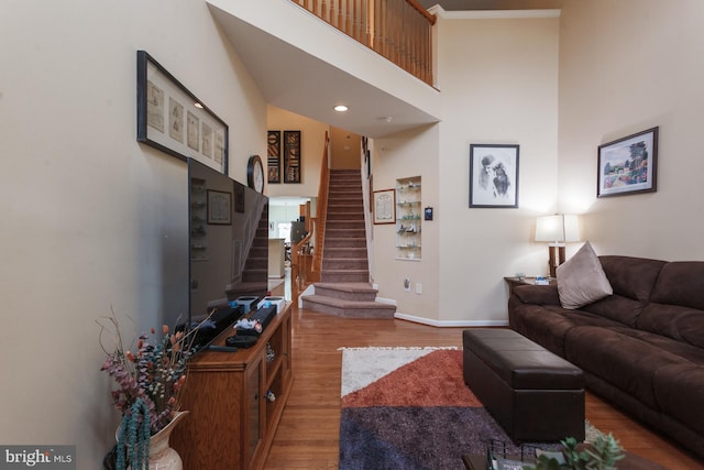 802 Geranium Dr, Warrington, PA 18976 - living room featuring stairs, wood finished floors, and a high ceiling