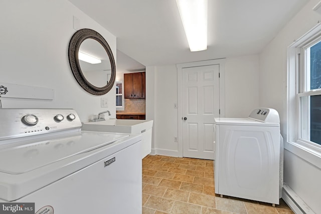 12 Charlestown Rd, Washington Boro, PA 17582 - washroom featuring baseboard heating and separate washer and dryer