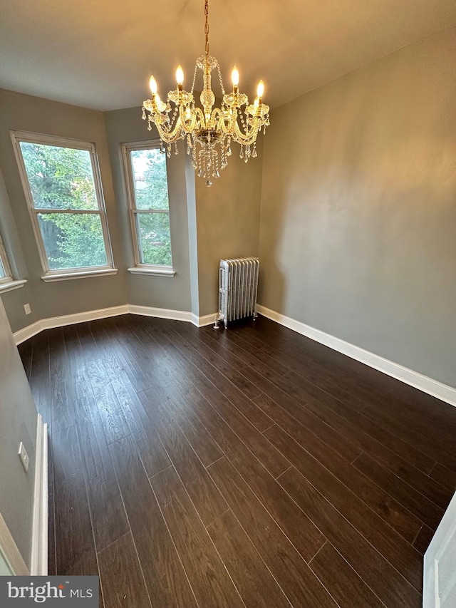 2937 N Judson St, Philadelphia, PA 19132 - spare room with radiator, a chandelier, and dark wood-style floors