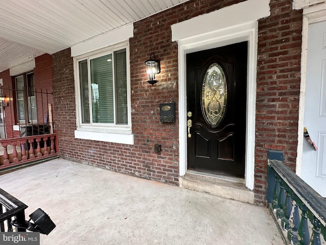 2937 N Judson St, Philadelphia, PA 19132 - property entrance with covered porch and brick siding