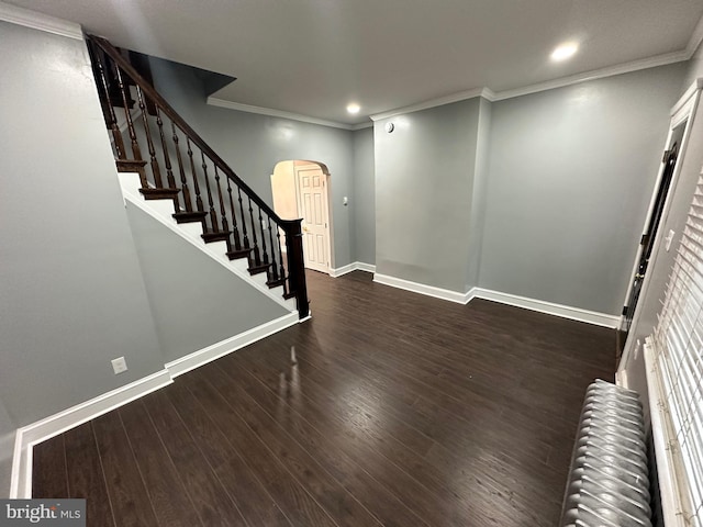 2937 N Judson St, Philadelphia, PA 19132 - foyer entrance featuring arched walkways, recessed lighting, stairs, wood finished floors, and ornamental molding