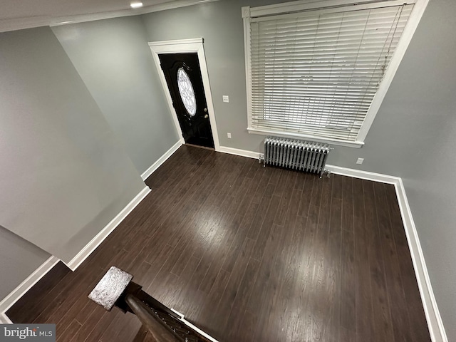 2937 N Judson St, Philadelphia, PA 19132 - foyer entrance featuring radiator heating unit and wood finished floors