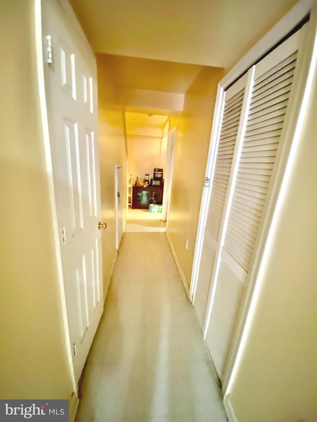 1064 W W Side Dr Unit 25-F, Gaithersburg, MD 20878 - corridor with baseboards and light tile patterned floors