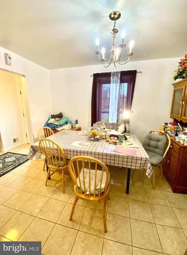 1064 W W Side Dr Unit 25-F, Gaithersburg, MD 20878 - dining room with light tile patterned floors and a chandelier