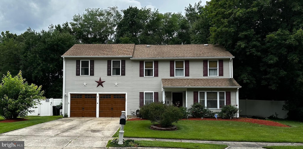 7 Lancaster Dr, Westampton, NJ 08060 - view of front of home with concrete driveway and a garage