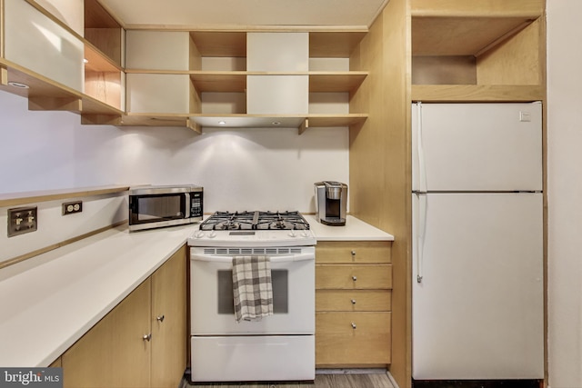 306 Canterbury Rd Unit 306-O, Bel Air, MD 21014 - kitchen featuring white appliances, open shelves, and light countertops