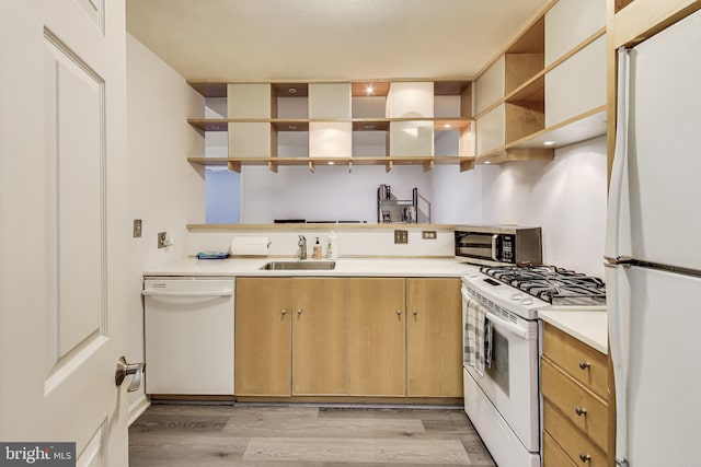 306 Canterbury Rd Unit 306-O, Bel Air, MD 21014 - kitchen with white appliances, open shelves, light wood-style flooring, and light countertops
