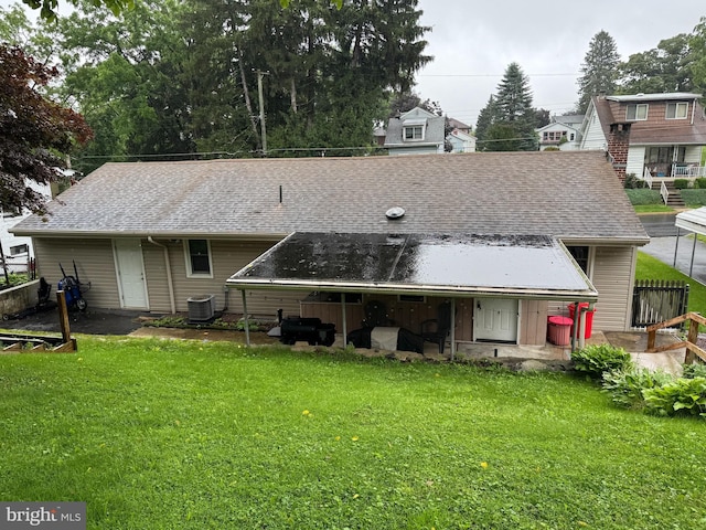 42 Reed St, Mohnton, PA 19540 - rear view of property with a lawn and roof with shingles