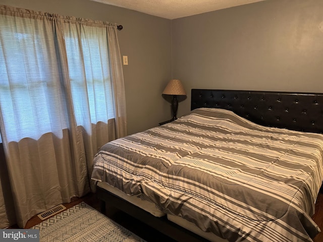 42 Reed St, Mohnton, PA 19540 - bedroom with a textured ceiling and wood finished floors