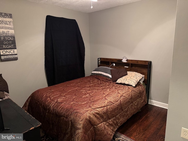 42 Reed St, Mohnton, PA 19540 - bedroom with wood finished floors and a textured ceiling
