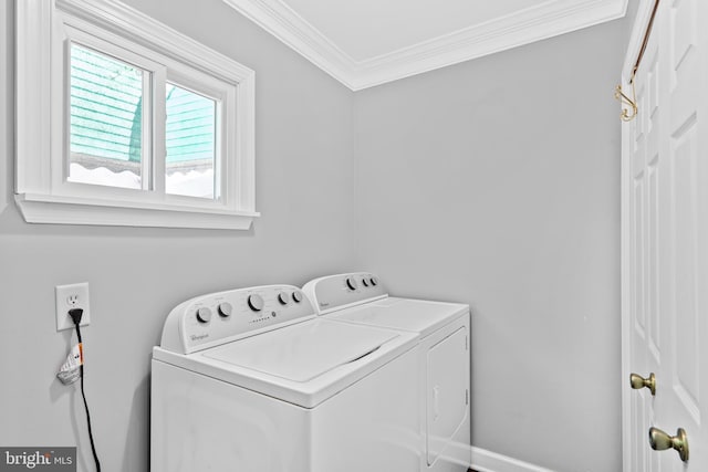 3207 Salmon St, Philadelphia, PA 19134 - laundry area featuring washing machine and dryer and crown molding