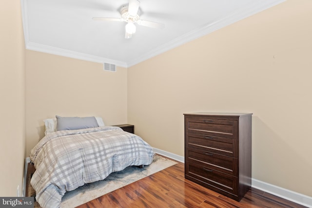 3207 Salmon St, Philadelphia, PA 19134 - bedroom with ornamental molding, wood finished floors, and a ceiling fan
