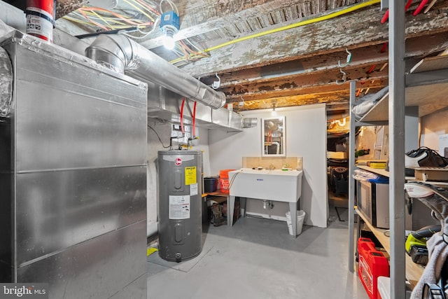 3207 Salmon St, Philadelphia, PA 19134 - unfinished below grade area with water heater and heating unit