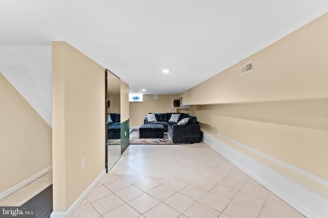 3207 Salmon St, Philadelphia, PA 19134 - living room with light tile patterned floors and recessed lighting