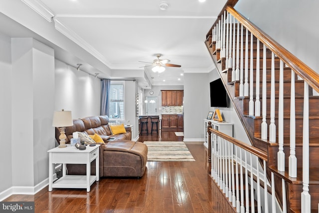 3207 Salmon St, Philadelphia, PA 19134 - living room with dark wood-style floors, a ceiling fan, stairway, and crown molding