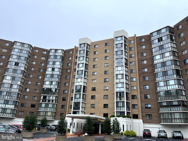 15100 Interlachen Dr Unit 4-701, Silver Spring, MD 20906 - view of apartment building / complex with uncovered parking