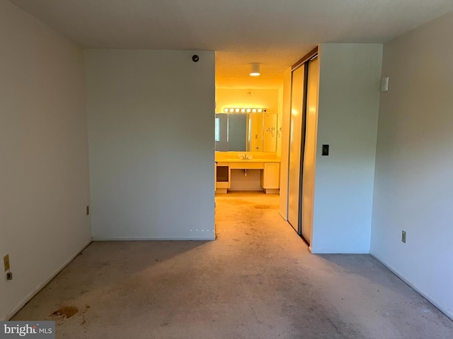 15100 Interlachen Dr Unit 4-701, Silver Spring, MD 20906 - empty room featuring a sink and baseboards