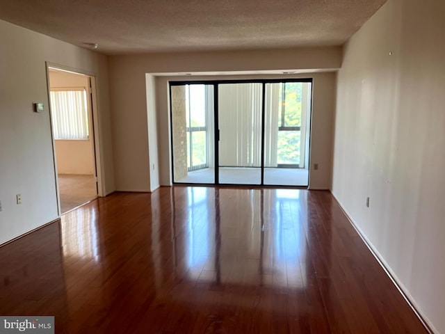 15100 Interlachen Dr Unit 4-701, Silver Spring, MD 20906 - empty room featuring hardwood / wood-style flooring