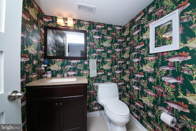 1318 E Eyre St, Philadelphia, PA 19125 - half bathroom with wallpapered walls, vanity, and tile patterned floors