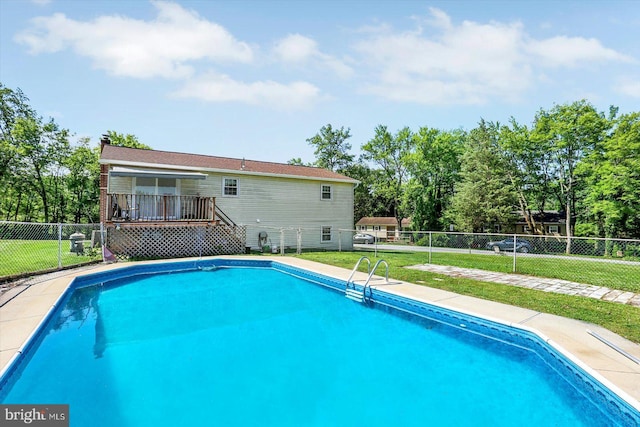225 Bobby Jones Dr, Etters, PA 17319 - view of pool featuring a wooden deck and view of scattered trees