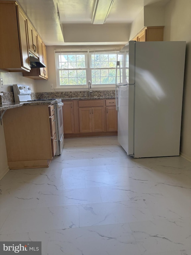 7763 New Providence Dr Unit 54, Falls Church, VA 22042 - kitchen with white appliances, under cabinet range hood, light marble finish flooring, and dark stone counters