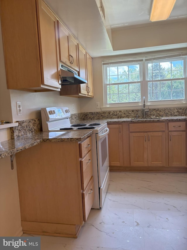 7763 New Providence Dr Unit 54, Falls Church, VA 22042 - kitchen with under cabinet range hood, white range with electric stovetop, dark stone countertops, and light marble finish flooring