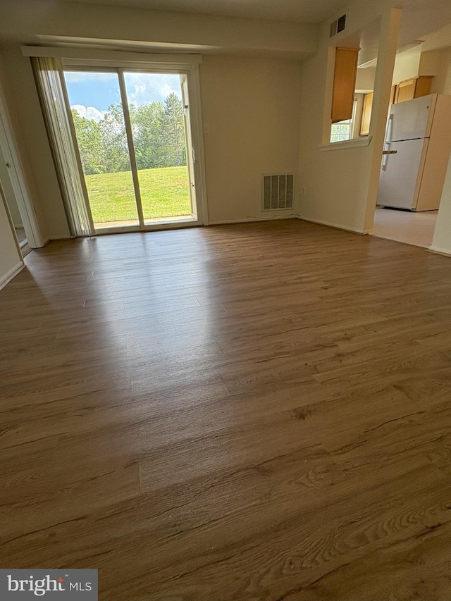 7763 New Providence Dr Unit 54, Falls Church, VA 22042 - spare room featuring wood finished floors and baseboards