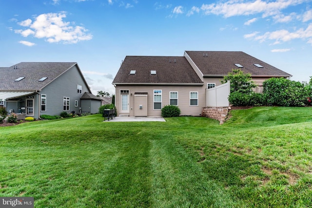 1605 Quincey Dr, Mechanicsburg, PA 17050 - back of property featuring a patio area and a lawn