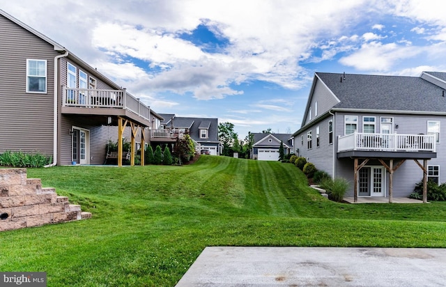 1605 Quincey Dr, Mechanicsburg, PA 17050 - view of grassy yard featuring a wooden deck, a patio area, and a residential view