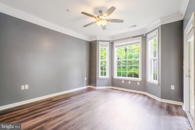 503 Sunset View Ter SE Unit 102, Leesburg, VA 20175 - spare room featuring plenty of natural light, wood finished floors, ornamental molding, and a ceiling fan