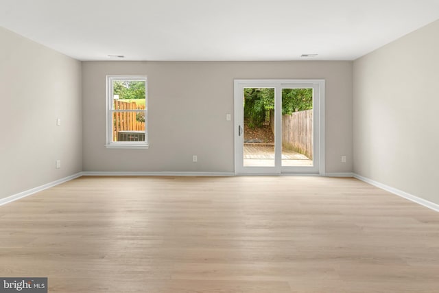 14 Ensign Ct, Essex, MD 21221 - spare room featuring plenty of natural light and light wood-style floors