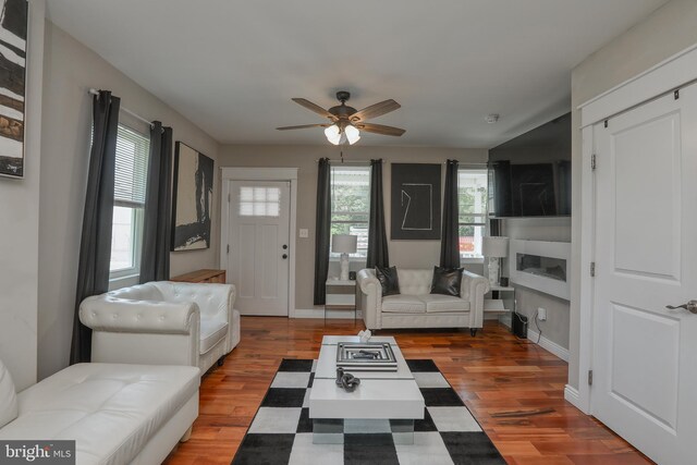 220 Rancocas Rd, Mount Holly, NJ 08060 - living room with ceiling fan, wood finished floors, and a glass covered fireplace