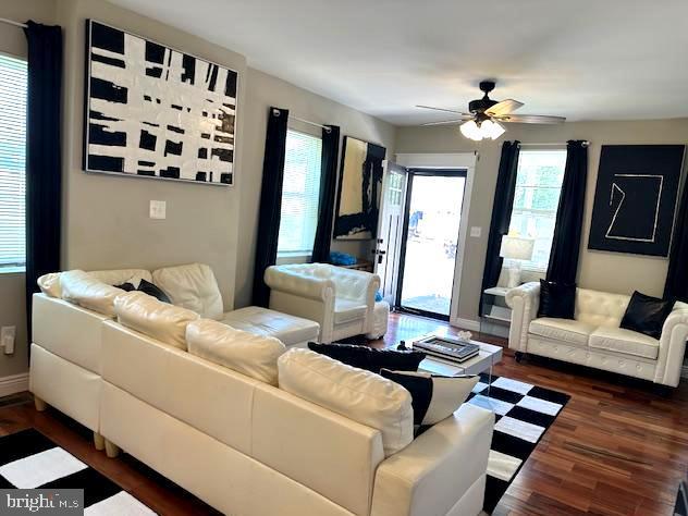 220 Rancocas Rd, Mount Holly, NJ 08060 - living room featuring plenty of natural light, dark wood-type flooring, and a ceiling fan