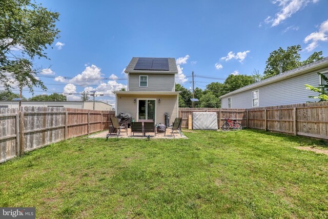 220 Rancocas Rd, Mount Holly, NJ 08060 - back of property with solar panels, a patio area, and a fenced backyard