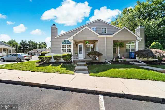 1401 Kenny, Burlington, NJ 08016 - view of front of property featuring a chimney, a front yard, and covered porch