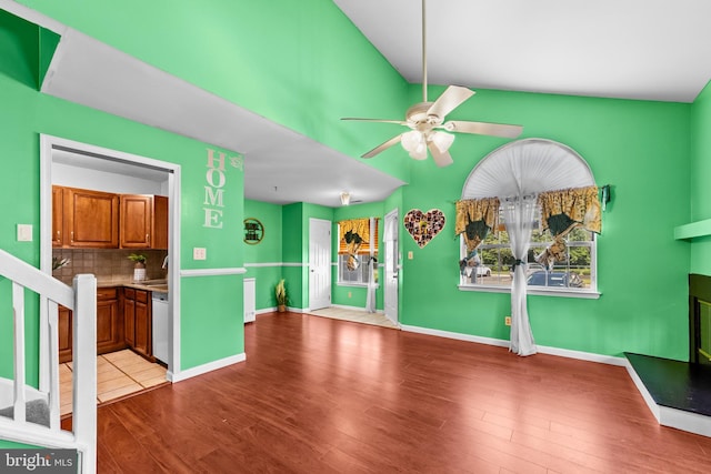 1401 Kenny, Burlington, NJ 08016 - unfurnished living room featuring a ceiling fan, wood finished floors, and high vaulted ceiling