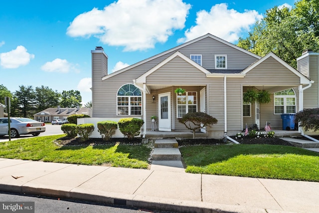 1401 Kenny, Burlington, NJ 08016 - view of front facade with covered porch, a front yard, and a chimney