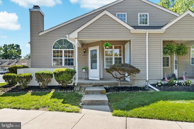 1401 Kenny, Burlington, NJ 08016 - view of front of home with a chimney, covered porch, and a front yard